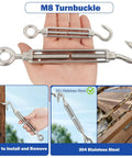 Close-up of two M8 turnbuckles from Beefy Heavy Duty 50 Foot Stainless Steel Wire Rope Kit, showing details and installation in hand.
