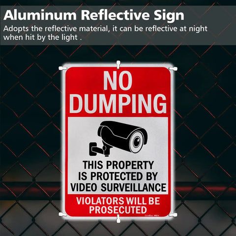 Large No Dumping Sign Keep Off My Patch Property Protected By Video Surveillance Reflective Aluminum Plate mounted on a fence.