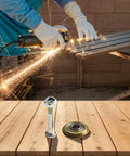 Person cutting metal with a grinder, foreground showing Manual Tile Cutter Replacement Rotary Bearing Wheels 22mm Metal Scoring Discs and screws.