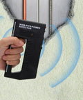 Metal Detector - Wire Finder Wall Scanner, Stud Sensor Hardware Tool in hand detecting wires behind a wall.