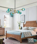 Six Light Blue Glass Ball Sputnik Chandelier Modern Mid Century Black And Gold Flush Mount Vintage Large Globe Pendant Light For Kitchen Island And Dining Area in bedroom setting.