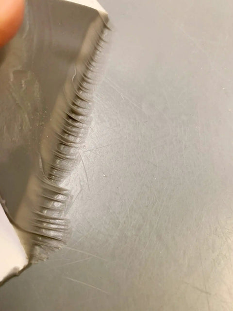 Close-up of 4 Inch By 10 Foot RV Roof Sealant Tape That Permanently Stops Leaks, Waterproof And UV Weatherproof, showing adhesive side.