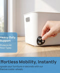 Person attaching 12pcs Ball Swivel Caster Wheels for Furniture, 360 Degree Rotation to a white storage box on wood floor.