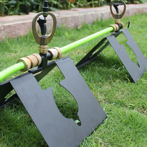Real Deal Rooftop Sprinkler Offering 360 Degree Rotating Spray Pattern for Lawn and Garden Irrigation with metal and hose setup.