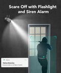 Wireless Outdoor Security Camera With 2K Color Night Vision And AI Motion Detection illuminating intruder with siren alarm.