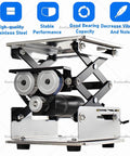 Smooth Electric Scissor Lift Table With Rockin 10kg Load And Snappy Height Adjust For Lab, Workshop Or Stage Gear Using Cool Rolling Sliding Base close-up of stainless steel lift mechanism with rollers and motor.