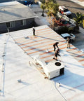 Workers applying Heavy Duty Liquid Waterproofing Membrane Multi Surface Crack And Leak Repair Coating Interior Exterior Water Based Moisture Blocker Heavy Duty Sealant Easy Brush Application 5 Gallon Sandy Beige on roof.