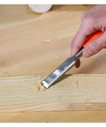 Economy 3 Piece Wood Chisel Set With One Half Inch Three Quarter Inch And One Inch Hardened Blades in use on wood surface