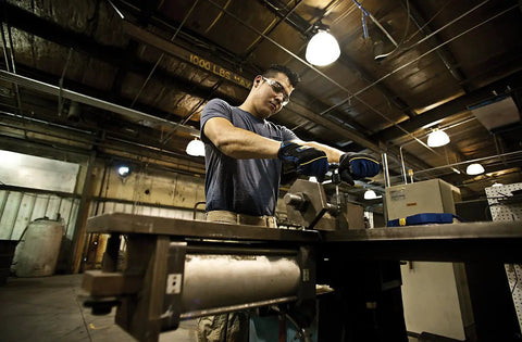 Man using Do It Yourself Drill And Tap Set For Quick Metal Threads With Quarter Inch 20 NC Tap And Thirteen Sixty Fourth Inch Drill Bit