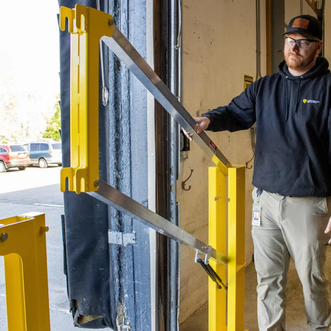 Heavy Duty Cantilever Dock Gate 12 Foot Wide Double Action Slick Pneumatic Struts in use at a loading bay