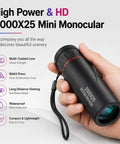 Hand holding 2000X25 monocular with multi-coated lens, waterproof design for long-distance viewing and outdoor adventures.