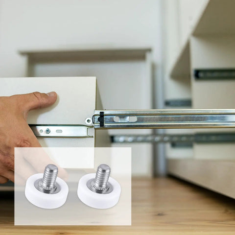 Close-up of a hand installing a drawer with Six Piece Set Of 19mm White Plastic Drawer Rollers Featuring Slick Cabinet Pulleys.