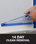 ProGrade Painter Tape With PaintBlock Technology Blue 1.5 Inch Wide Multi Surface Masking Tape Medium Adhesion 6 Rolls 1.41 In X 60 Yds For Walls Baseboards Trim Glass And Cars being peeled off baseboard with clean removal