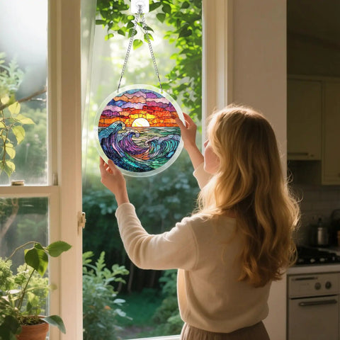 Person hanging Ocean Sunset Puzzle Suncatcher Kit With 83 Pieces For Doors Garden And Window Hanging Easy Snap Together DIY Acrylic Sun Catcher Craft Seven Point Four Inches No Tools Needed on window