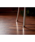 Chair legs on hardwood floor with Beige 32 Piece Round One Inch Felt Furniture Pads With Self Stick Adhesive Protect Hardwood Floors From Nicks Dents And Scratches While Moving Furniture Like A Pro.