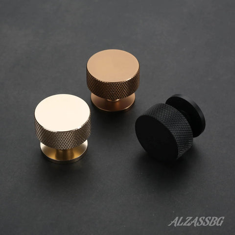 Matte Black Cabinet Knobs 15 Pack 1.2 Inch Knurled Round Kitchen Knobs For Cabinets And Drawers AL6023MB displayed with gold and silver knobs