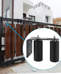 Slide Gate Guide Roller With Two And A Half Inch UHMW Nylon Wheel And Beefy Steel Bracket installed on a wooden gate