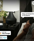 Person using Smart Thermostat For Home Heating And Cooling, ENERGY STAR Certified, Wi Fi Programmable with Alexa in bedroom