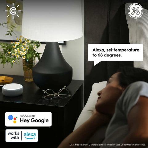 Person using Smart Thermostat For Home Heating And Cooling, ENERGY STAR Certified, Wi Fi Programmable with Alexa in bedroom
