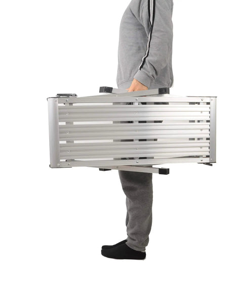Person carrying a folded Heavy Duty Aluminum Work Platform Ladder, Foldable 30 x 12 x 20 Inch Platform, 330 Lb Capacity, no assembly