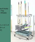 Movable Broom Mop Holder Mount Rack With Non Slip Clips Stainless Steel Tool Organizer shown with mops and brooms