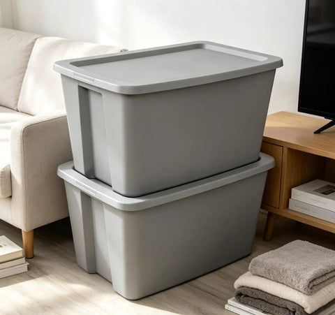 Heavy Duty 30 Gallon Plastic Storage Bin With A No Hassle Snap Closure Built Tough For Massive Household Items Plus Plenty Of Room For Seasonal Gear stacked in a living room.