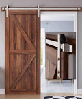 Heavy-Duty Brushed Nickel Sliding Barn Door Hardware Kit For 36-40 Inch Doors installed on wooden door
