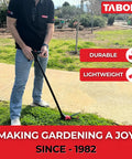 Person using Long Reach Grass Shears With Wheeled Glide Support And 180 Degree Swivel Blade for trimming grass.