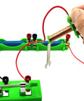 Hands On Electromagnet And Basic Electricity Circuit Kit with green plastic base and red wires for school lab DIY physics experiments