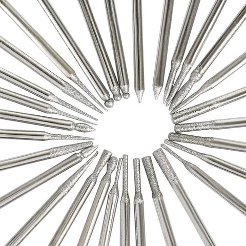 A circular array of bits from the 90 Pc Diamond Burr Bits Kit For Engraving And Carving On Glass Gemstone Metal, Rotary Tool Set with 1/8 Inch Shank.