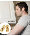 Man installing cabinet with Stainless Steel Self Closing Reversible Door Hinge Two Pack Hidden Rotation Pivot Hinge inset