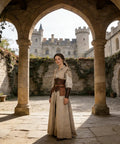 Woman in medieval attire with Easy Adjust Vintage Brown Leather Waist Belt With Heavy Duty Industrial Buckle in castle setting.