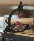 Rock Solid Woodturning Steady Rest For 12 14 And 16 Inch Swing Lathes with wood piece held by clamps during lathe work.