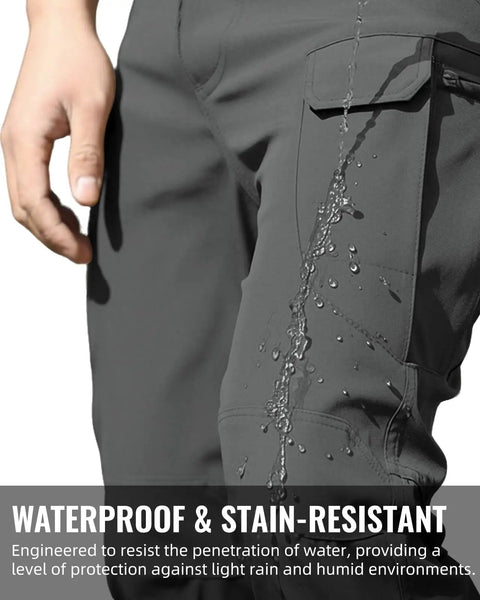 Water streaming off Mens Tactical Cargo Pants With Stretch Waterproof Fabric Durable Hiking And Work Pants Multi Pocket Cargo Breathable Abrasion Resistant Outdoor Gear No Belt Dark Gray.