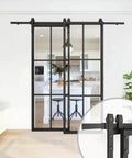 Front view of Bypass Double Glass Barn Door Set with 6.6Foot Side Mounted Hardware, two 30x84 in clear glass panels in aluminum frame installed.