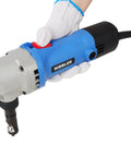 Heavy Duty 500W Electric Sheet Metal Nibbler Cuts Up To 16 Gauge Steel And Aluminum With 360 Degree Swiveling Head For Precision Metalworking, Auto Body Repair Hvac Ducting Fabrication Tasks At 2000 RPM held in hand with glove.