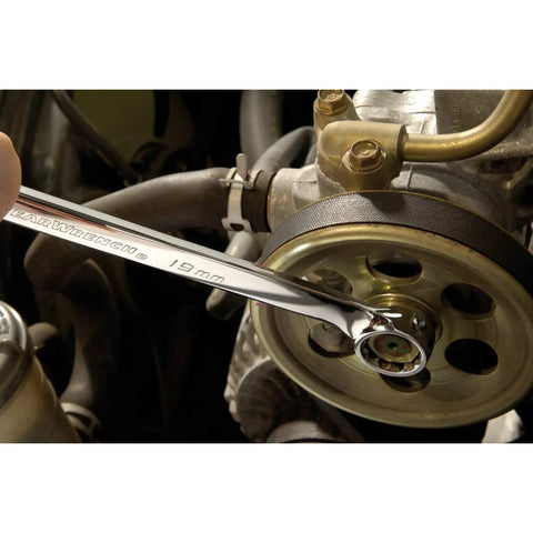 19 mm 12-point wrench in use from 30 Piece Long Pattern SAE And Metric Wrench Set With Racks, 12 Point Wrenches For Tight Spaces, Easy Read Size Markings, Alloy Steel Construction For Strength And Longevity, One Quarter To One Inch And 8-22 mm