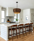 XSDeTu Farmhouse Metal Pendant Light, 2‑Tier Chandeliers for Dining Room hanging in a modern kitchen over a white island.