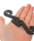 Premium Four Pack Carbon Steel Barn Door Hinge Hardware In Matte Black for smooth sliding operation, held in hand.