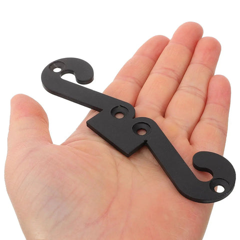 Premium Four Pack Carbon Steel Barn Door Hinge Hardware In Matte Black for smooth sliding operation, held in hand.