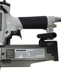 Close-up of a 23 gauge pin and brad nailer with built-in air duster, showing metallic finish and ergonomic grip.