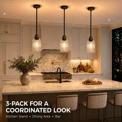 HXXLFONEDP 3 Pack Kitchen Island Pendant Lights, Ribbed Glass, Black hanging over a kitchen island with a marble countertop.