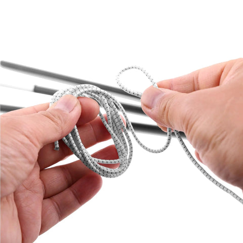 Hands holding Replacement Shock Cord Kit for Tent Poles and Outdoor Gear Built Tough Elastic Bungee Cord 0.09 Inch Diameter 18 Feet Long