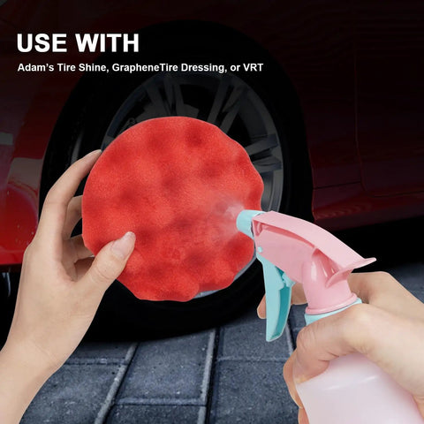 Spraying liquid on a Two Pack Large Tire Shine Applicator Pad With Hex Grip for Even Coats of Tire Shine before car detailing
