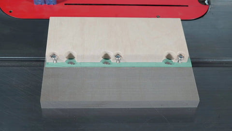 ZeroPlay Miter Bars 2-Pack With MatchFit Jig Handle for table saw sled shown in close-up on table saw surface.