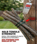 40 lb tensile strength zip ties securing branches with a tight lock, shown with measuring device