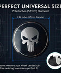Four 2.2 Inch Metal Wheel Center Caps With A Badass Skull Pattern Universal Car Truck Rim Hub Covers showing the perfect fit size.