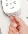 Hand installing Two Piece Security Quick Thumb Screws Designed For MyQ Smart Garage Door Video Keypad on wall.