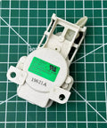 Washer Actuator Replacement Part TD12ZS1 White Direct Fit Control Board for Various Models Easy Install, Reliable Washer Operation, 5304492254 Compatible, Major Appliance Repair Accessory. White plastic washer actuator with mounting tabs and green label.