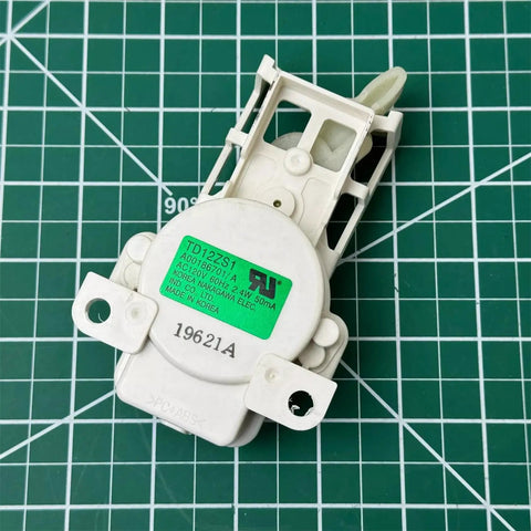 Washer Actuator Replacement Part TD12ZS1 White Direct Fit Control Board for Various Models Easy Install, Reliable Washer Operation, 5304492254 Compatible, Major Appliance Repair Accessory. White plastic washer actuator with mounting tabs and green label.